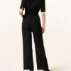sandro Jumpsuit Damen, Schwarz